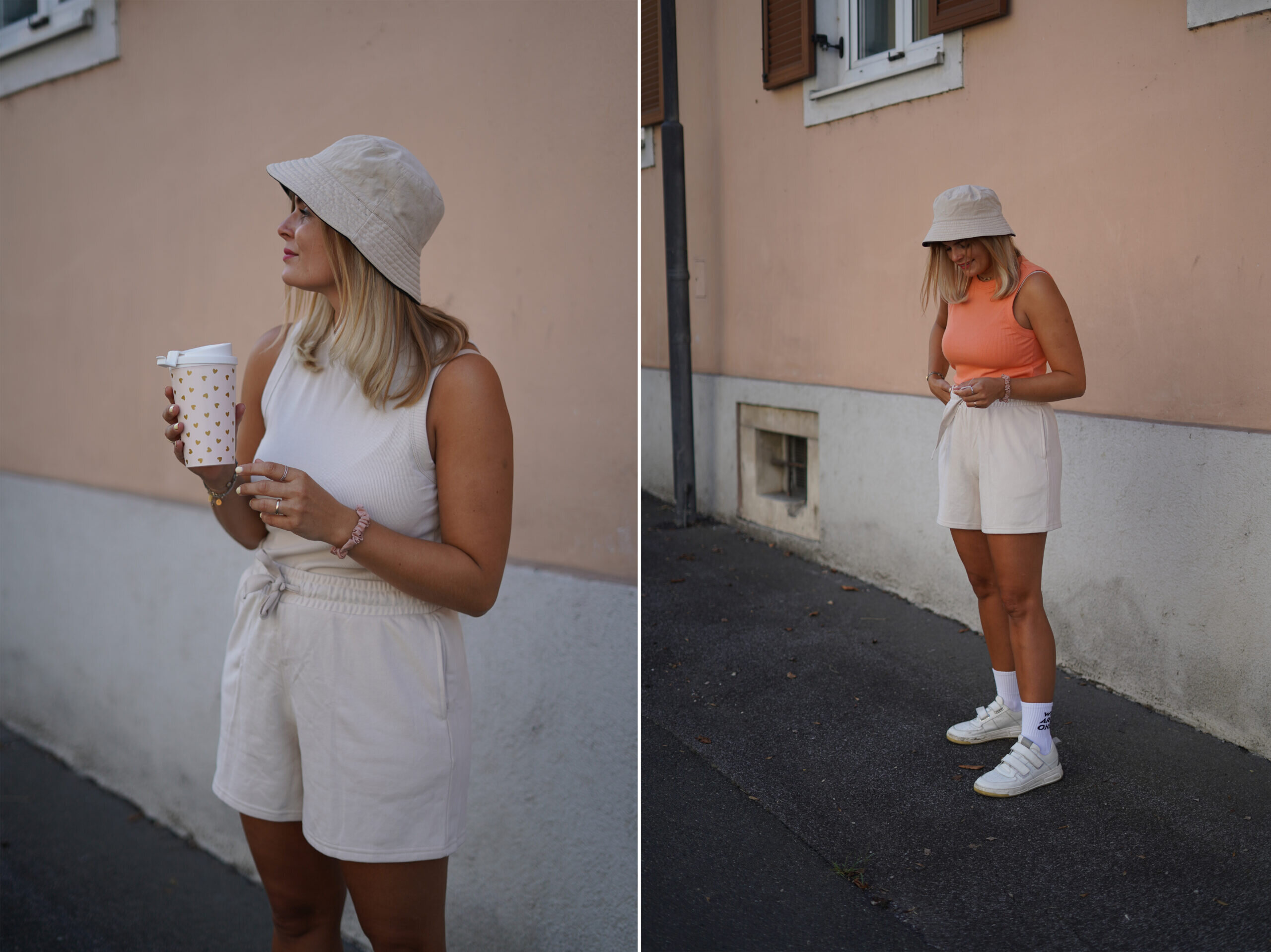Frau mit Hut in Sommeroutfit vor rosa Wand