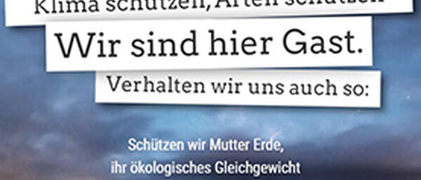 Texttafel: „Wir sind hier Gast. Klima schützen.“