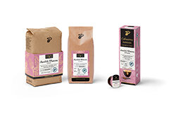 Drei Verpackungen Arabica-Kaffee in Rosa und Braun