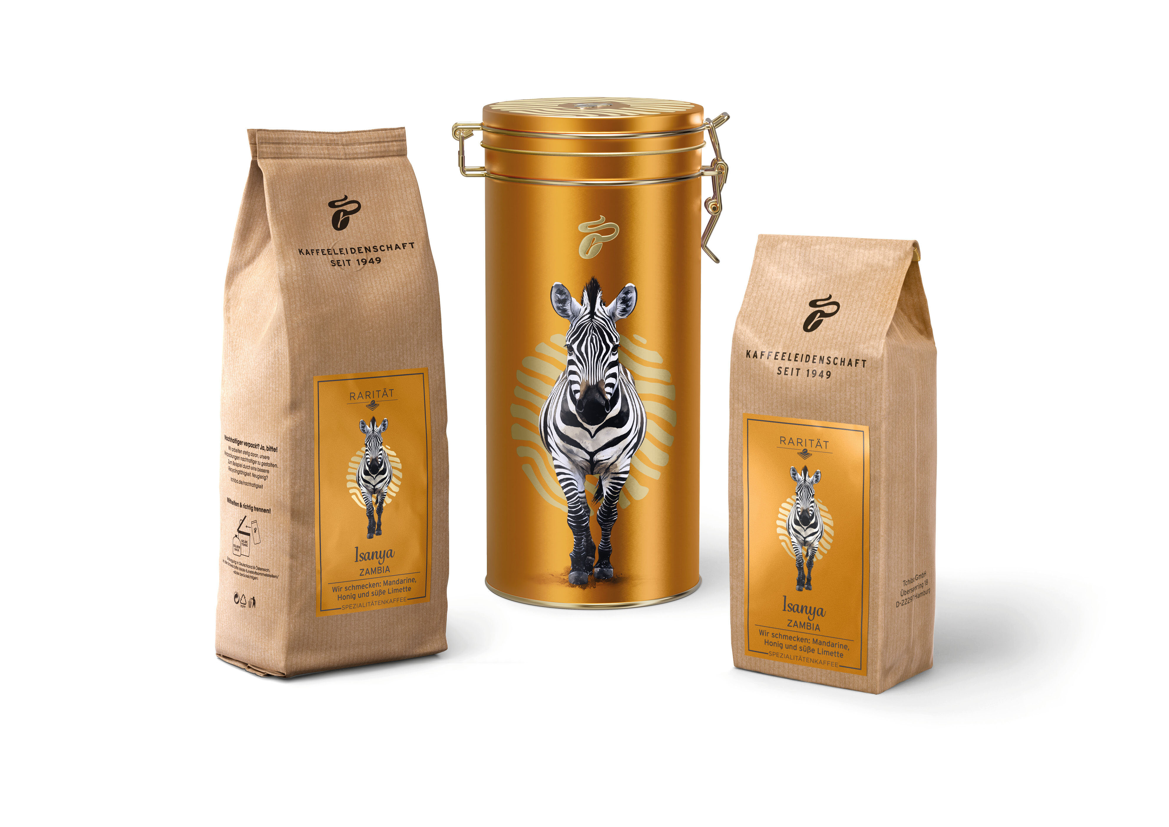 Goldene Kaffeedose und zwei Kaffeetüten mit Zebra