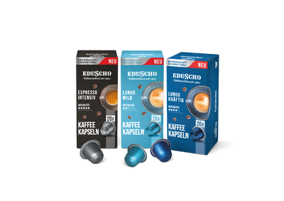 Drei Eduscho Kaffeekapselpackungen nebeneinander