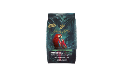 Kaffee-Packung „Honduras Limited“ mit roten Papageien