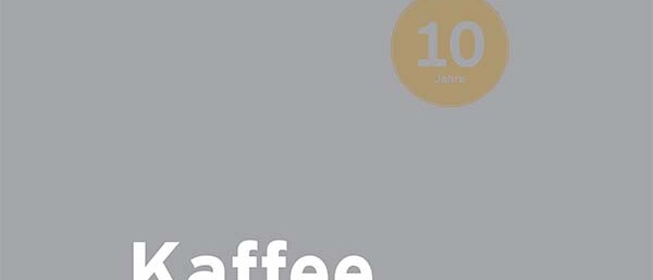 Graues Cover mit Schriftzug „Kaffee in Zahlen“