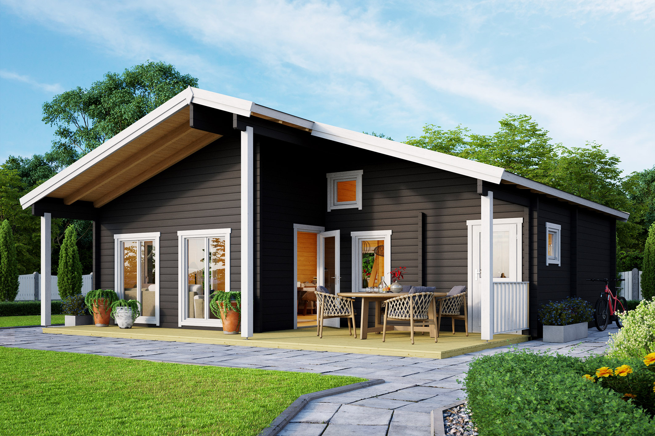 Modernes schwarzes Holzhaus mit Terrasse im Garten