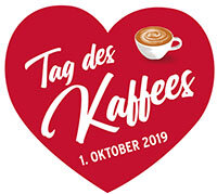 Rotes Herz mit Schrift „Tag des Kaffees“