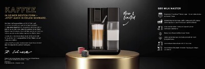 Schwarze Qbo Kaffeemaschine mit Latte Macchiato