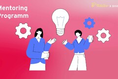 Zwei Personen im Mentoring-Programm vor Glühbirne