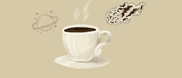 Tasse Kaffee mit Planet und Komet daneben