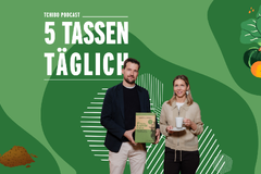 Zwei Personen mit Kaffee und Gemüsegrafiken